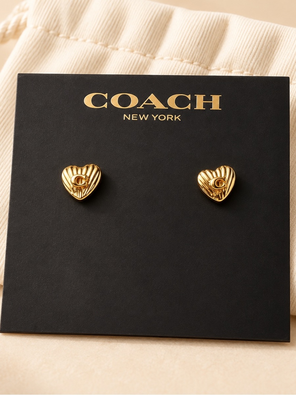 COACH Gold Heart Ribbed Stud Earrings